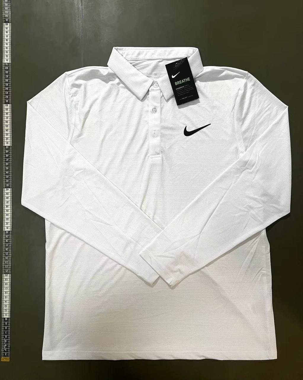 Zdjęcie QC 1 z 1 — Nike Dri-FIT UV Polo and Half-Zip Performance Tops [7 styles]